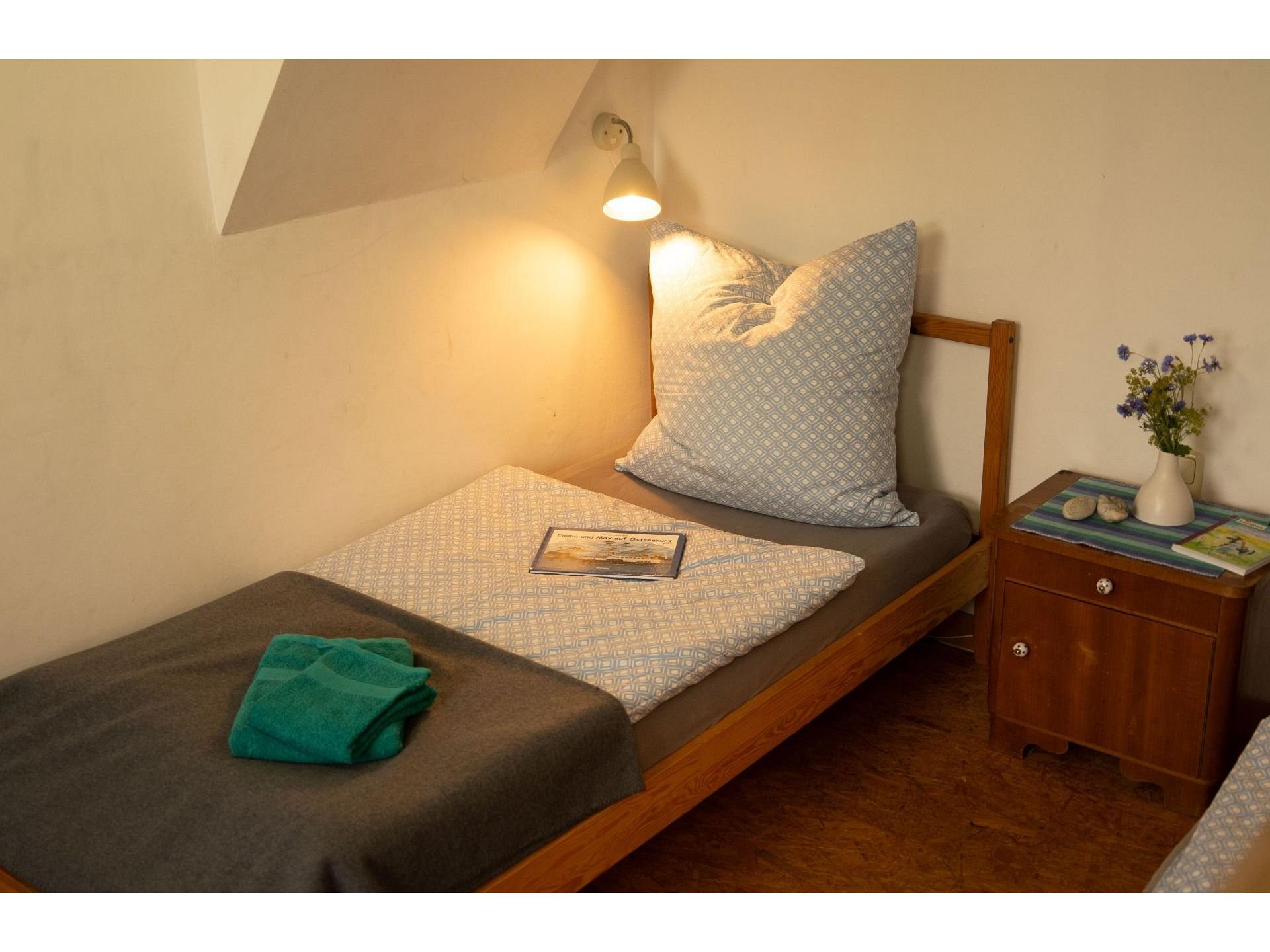 Schlafzimmer mit 3 Betten