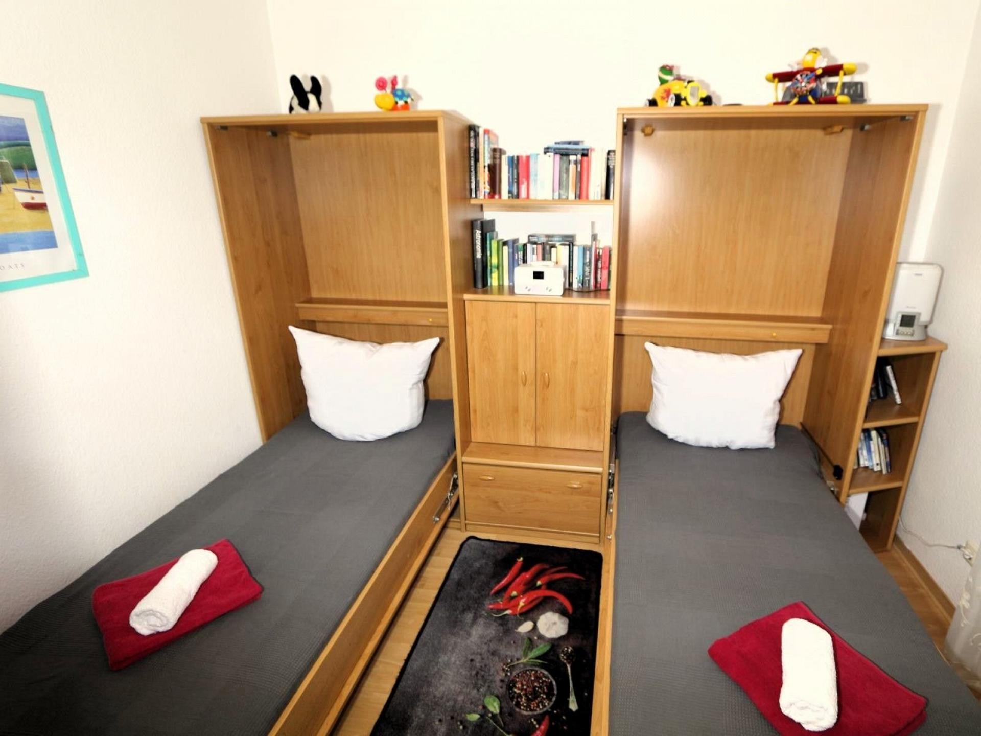 Schlafzimmer mit Einzelbe